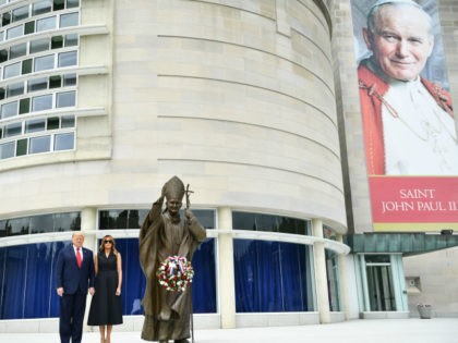 US President Donald Trump and First Lady Melania Trump visit the Saint John Paul II National Shrine, to lay a ceremonial wreath and observe a moment of remembrance under the Statue of Saint John Paul II on June 2, 2020 in Washington,DC. (Photo by Brendan Smialowski / AFP) (Photo by …