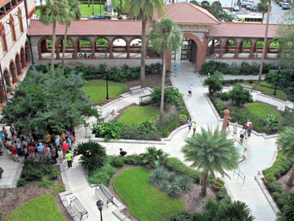 In this photo taken Oct. 28, 2016, people gather in the courtyard of Flagler College in St