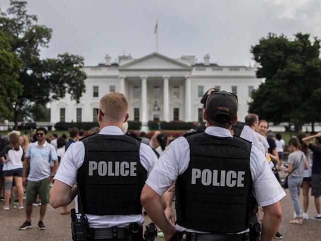 WASHINGTON, DC - AUGUST 11: Police patrol outside the White House on August 11, 2018 in Wa