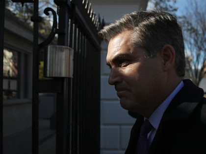 WASHINGTON, DC - NOVEMBER 16: CNN White House correspondent Jim Acosta arrives at the White House gate as he returns to work following a court ruling restoring his ability to report from the White House on November 16, 2018 in Washington, DC. CNN filed a lawsuit against U.S. President Donald …