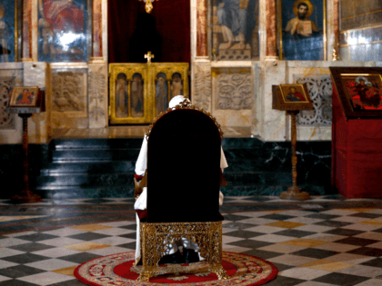 Pope Francis sits in prayer before the throne of Saint Cyril and Methodius at Alexander Nevski Cathedral in Sofia on May 5, 2019. - Pope Francis urged Bulgarians to open their hearts and doors to refugees as he began a visit to the European Union's poorest country, where the main …