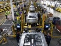 Workers assemble cars at the newly renovated Ford's Assembly Plant in Chicago, June 24, 2019. - The plant was revamped to build the Ford Explorer, Police Interceptor Utility and Lincoln Aviator. (Photo by JIM YOUNG / AFP) (Photo credit should read JIM YOUNG/AFP via Getty Images)