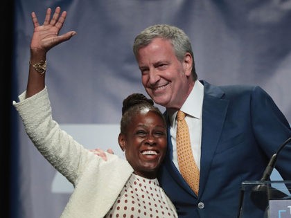 CEDAR RAPIDS, IOWA - JUNE 09: Democratic presidential candidate and New York City Mayor Bill De Blasio introduces his wife Chirlane McCray while speaking at the Iowa Democratic Party's Hall of Fame Dinner on June 9, 2019 in Cedar Rapids, Iowa. Nearly all of the 23 Democratic candidates running for …
