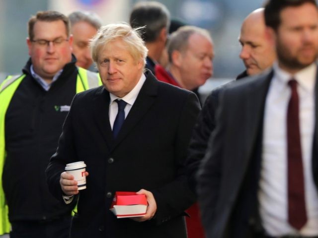 LONDON, ENGLAND - NOVEMBER 30: British Prime Minister Boris Johnson visits the scene of ye