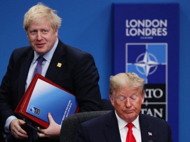 HERTFORD, ENGLAND - DECEMBER 04: UK Prime Minister Boris Johnson (L) and U.S. President Donald Trump (R) attend the NATO summit at the Grove Hotel on December 4, 2019 in Watford, England. France and the UK signed the Treaty of Dunkirk in 1947 in the aftermath of WW2 cementing a …
