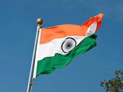An Indian national flag is pictured before the arrival of Brazilian President Jair Bolsona