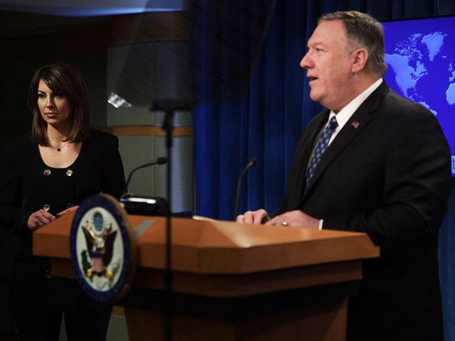 WASHINGTON, DC - FEBRUARY 25: U.S. Secretary of State Mike Pompeo speaks as State Department spokesperson Morgan Ortagus listens during a news briefing at the State Department February 25, 2020 in Washington, DC. Secretary Pompeo discussed various topics including the coronavirus outbreak and the peace talks in Afghanistan. (Photo by …