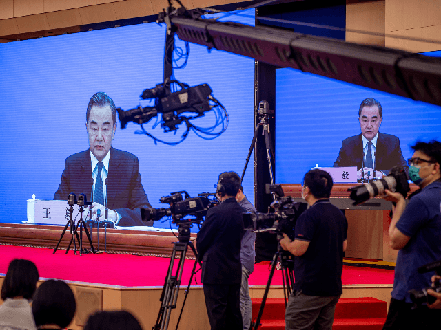 China's Foreign Minister Wang Yi speaks during his online video link press conference during the National People's Congress (NPC) at the media centre in Beijing on May 24, 2020. (Photo by NICOLAS ASFOURI / AFP) (Photo by NICOLAS ASFOURI/AFP via Getty Images)