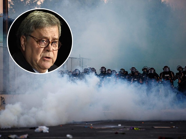 (INSET: U.S. Attorney General William Barr) Police in riot gear block a road near the 5th