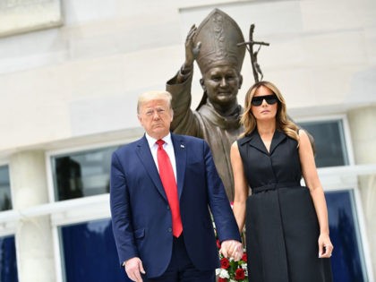US President Donald Trump and First Lady Melania Trump visit the Saint John Paul II National Shrine, to lay a ceremonial wreath and observe a moment of remembrance under the Statue of Saint John Paul II on June 2, 2020 in Washington,DC. (Photo by Brendan Smialowski / AFP) (Photo by …