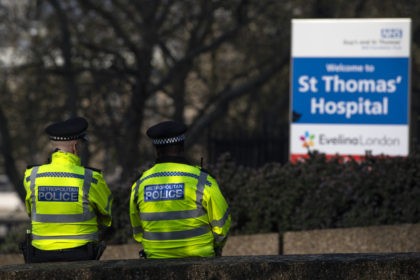 LONDON, ENGLAND - APRIL 09: Police stand guard outside St Thomas' Hospital on April 09, 2020 in London, England. Prime Minister Boris Johnson is still being cared for in the intensive care unit at St Thomas' Hospital after his coronavirus symptoms worsened on Monday night. (Photo by Justin Setterfield/Getty Images)