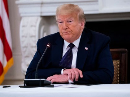WASHINGTON, DC - JUNE 08: U.S. President Donald Trump makes remarks as he participates in a roundtable with law enforcement officials in the State Dining Room of the White House, June, 8, 2020 in Washington, DC. From L-R is Attorney General William Barr, Daniel J, Cameron Attorney General for the …