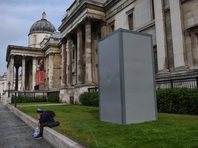 LONDON, ENGLAND - JUNE 12: A protective barrier is seen around the statue of George Washington in Trafalgar Square in anticipation of protests today on June 12, 2020 in London, England. Outside the Houses of Parliament, the statue of former Prime Minister Winston Churchill was spray-painted with the words "was …