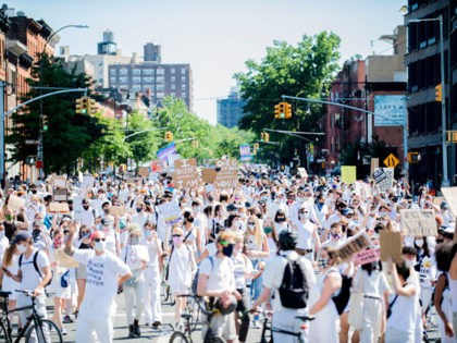 NEW YORK, NY - JUNE 14: Thousands fill the streets in support of Black Trans Lives Matter and George Floyd on June 14, 2020 in the Brooklyn borough of New York City. Protests continue all around the country in the wake of the death of Floyd while in Minneapolis police …