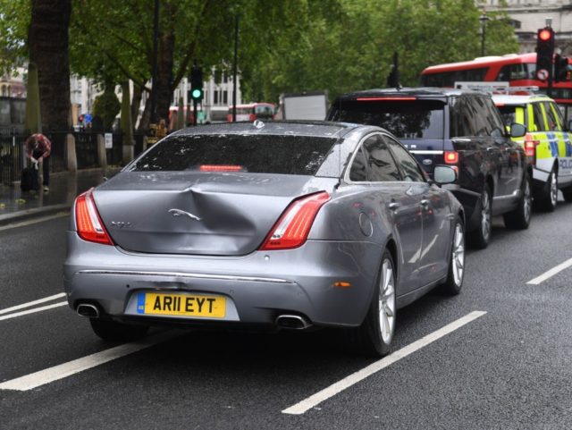 A large dent in the car of Britain's Prime Minister Boris Johnson is seen after an in