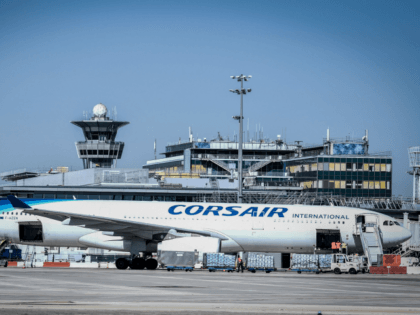 A photograph taken on June 24, 2020, shows an Corsair plane parked on the tarmac at the Terminal 3 of the Orly airport, in Orly on the outskirts of Paris, a few days before its reopening as France eases lockdown measures taken to curb the spread of the COVID-19 (the …