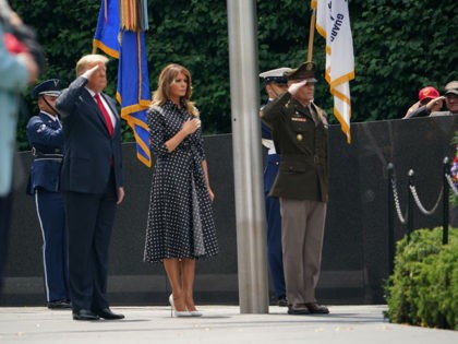 US President Donald Trump and First Lady Melania Trump pay their respects as they visit the Korean War Veterans Memorial in Washington, DC on June 25, 2020. - North and South Korea on June 25, 2020 separately marked the 70th anniversary of the start of the Korean War, a conflict …