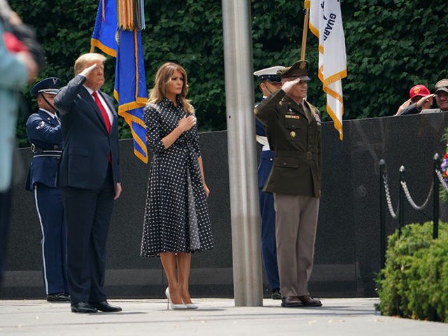 US President Donald Trump and First Lady Melania Trump pay their respects as they visit th