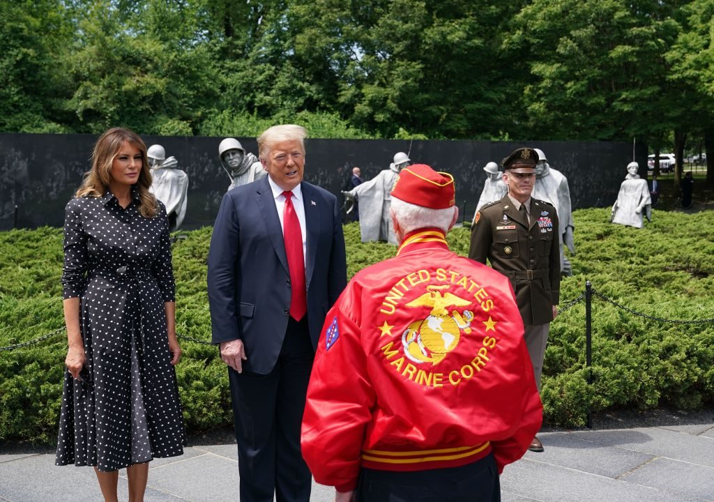 US President Donald Trump and First Lady Melania Trump visit the Korean War Veterans Memorial in Washington, DC on June 25, 2020. - North and South Korea on June 25, 2020 separately marked the 70th anniversary of the start of the Korean War, a conflict that killed millions of people and has technically yet to end.The fighting ended with an armistice that was never replaced by a peace treaty, leaving the peninsula and millions of families split by the Demilitarized Zone. (Photo by MANDEL NGAN / AFP) (Photo by MANDEL NGAN/AFP via Getty Images)