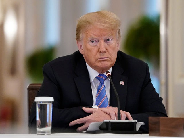 WASHINGTON, DC - JUNE 26: U.S. President Donald Trump participates in a meeting of the American Workforce Policy Advisory Board in the East Room of the White House on June 26, 2020 in Washington, DC. Earlier in the day President Trump canceled his scheduled weekend trip to his private golf club …