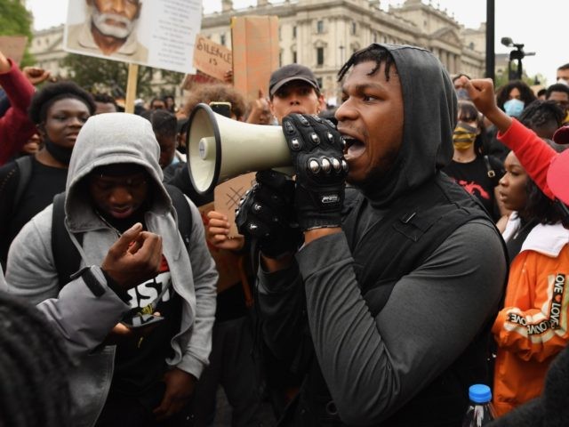 LONDON, ENGLAND - JUNE 03: Actor John Boyega speaks to the crowd during a Black Lives Matter protest in Hyde Park on June 3, 2020 in London, United Kingdom. The death of an African-American man, George Floyd, while in the custody of Minneapolis police has sparked protests across the United …