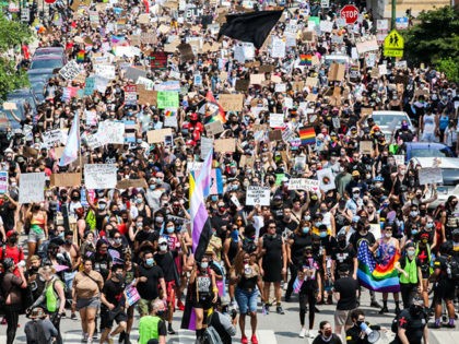 CHICAGO, ILLINOIS - JUNE 28: Thousands gathered in the streets for the Pride Without Prejudice march in Boystown on June 28, 2020 in Chicago, Illinois. Demonstrators gathered to march for LGBTQ and Black Lives as protests continue across the nation. (Photo by Natasha Moustache/Getty Images)
