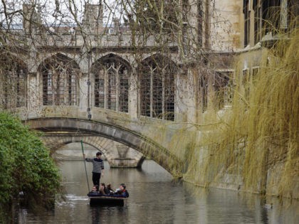 CAMBRIDGE, UNITED KINGDOM - MARCH 13: Members of the public punt along the river Cam on M