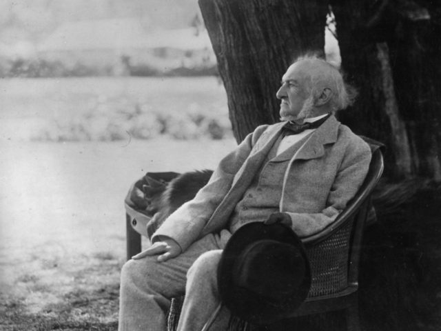 1894: William Ewart Gladstone (1809 - 1898) taking it easy during a fete at his home, Harw