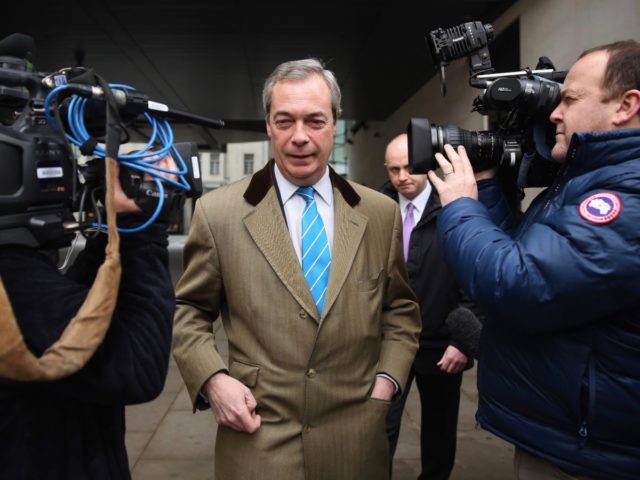 LONDON, ENGLAND - APRIL 02: UKIP party leader Nigel Farage leaves Broadcasting House after an interview on the BBC's Today Programme on radio 4 on April 2, 2015 in London, England. Mr Farage will face his political party opponents this evening when Green party leader Natalie Bennett, Liberal Democrat leader …