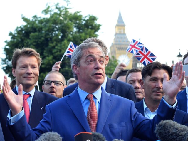 Leader of the United Kingdom Independence Party (UKIP), Nigel Farage (C) speaks during a press conference near the Houses of Parliament in central London on June 24, 2016. Britain has voted to leave the European Union by 51.9 percent to 48.1 percent, final results from all 382 of Britain's local …