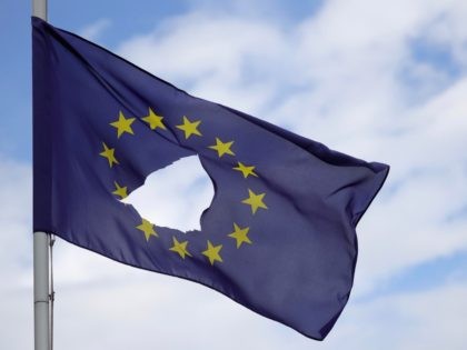 KNUTSFORD, UNITED KINGDOM - JUNE 24: A European Union flag, with a hole cut in the middle,