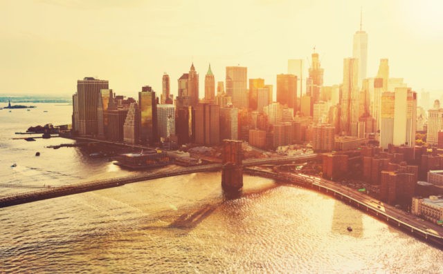 Brooklyn Bridge over the East River in New York City at sunset