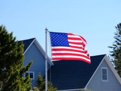 American flag at suburban neighborhood