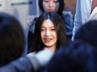 Beijing, CHINA: Taiwanese actress Barbie Xu, also known as Big S in China, gets mopped by the Chinese media during a product promotion in Beijing 16 December 2006. Taiwanese actresses are gaining wide popularity in mainland China and are constantly appearing in various advertising promotions. AFP PHOTO (Photo credit should …