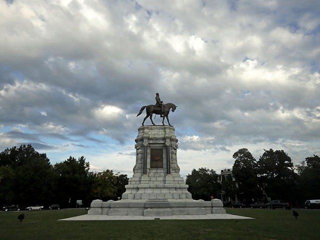 RICHMOND, VA - AUGUST 23: A statue of Confederate General Robert E. Lee, unveild in 1890, stands at the center of Lee Circle along Monument Avenue August 23, 2017 in Richmond, Virginia. Richmond Mayor Levar Stoney's Monument Avenue Commission -- composed of academics, historians and community leaders --will include an …