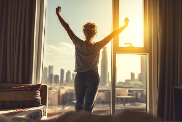 Woman in apartment in the morning