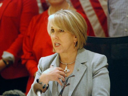 New Mexico Gov. Michelle Lujan Grisham signed a red-flag gun bill Tuesday, Feb. 25, 2020, in Santa Fe, N.M., that allows state district courts to order the temporary surrender of firearms. The Democratic governor urged sheriffs to resign if they refuse to enforce the new law that can temporarily remove …