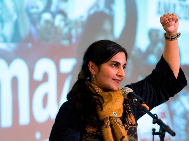 Seattle City Councilmember Kshama Sawant addresses supporters during her inauguration and "Tax Amazon 2020 Kickoff" event in Seattle, Washington on January 13, 2020. (Photo by Jason Redmond / AFP) (Photo by JASON REDMOND/AFP via Getty Images)
