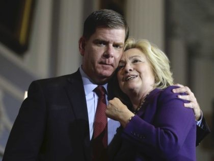Marty Walsh and Hillary Clinton at Faneuil Hall (Stephen Senne / Associated Press)