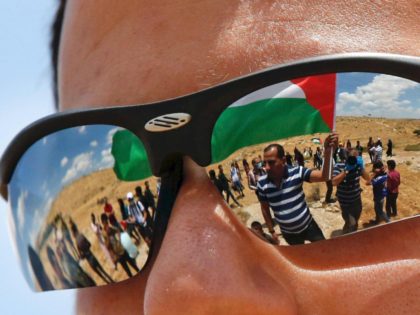 Palestinian flag Israeli sunglasses (Hazem Bader / AFP / Getty)