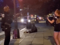 DC Metro officer lectures protester (Screenshot / Breitbart News)