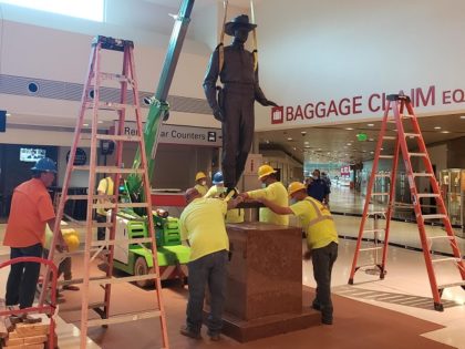 The statue of a Texas Ranger is removed from the lobby of Dallas Love Field. (PHOTO: Dalla