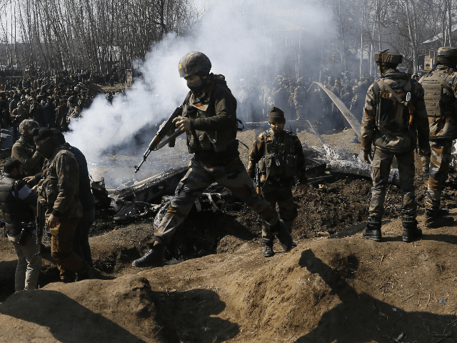APTOPIX India Kashmir Pakistan Indian army soldiers arrive near the wreckage of an Indian