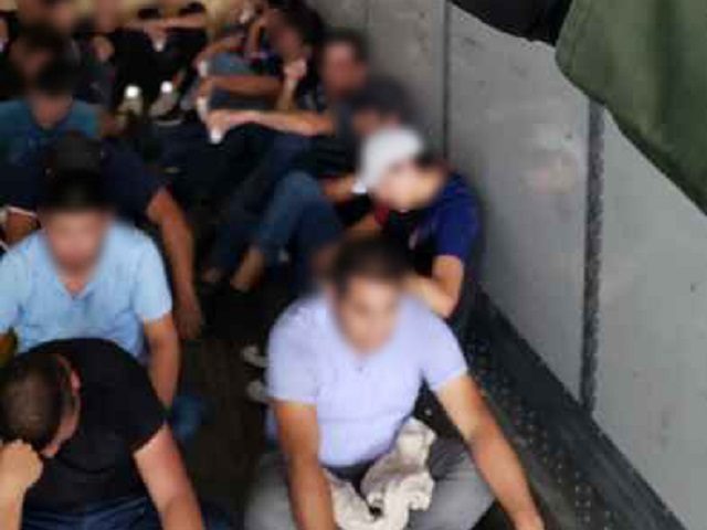 Border Patrol agents find a group of illegal aliens locked in a tractor-rig. (File Photo: U.S. Border Patrol/Laredo Sector)