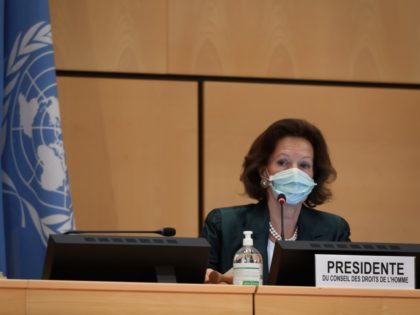 The president of the Human Rights Council, Austrian Ambassador Elisabeth Tichy-Fisslberger, wearing a protective face mask is seen during the resuming of a UN Human Rights Council session after it interruption in March over the coronavirus pandemic on June 15, 2020 in Geneva. - The UN's top rights body Monday …