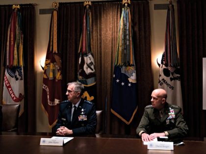 WASHINGTON, DC - MAY 09: General John Hyten, Vice Chairman of the Joint Chiefs of Staff and General David Berger, Commandant of the United States Marine Corps, listen a meeting between President Donald Trump, Senior Military Leadership and the National Security Team the Cabinet Room of the White House in …