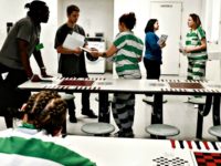 Inmates receive voter registration information from the Colorado Criminal Justice Reform Coalition, in Denver, Colorado, on September 25, 2018. Aaron Ontiveroz/The Denver Post via Getty Images