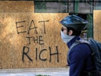 WASHINGTON, DC - JUNE 01: Windows are boarded up on a BB&T bank building that was vandalized during overnight unrest, June 1, 2020 in Washington, DC. Protests and riots continue across American following the death of George Floyd, who died after being restrained by Minneapolis police officer Derek Chauvin. Chauvin, …