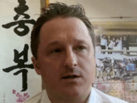 China Charges Captive Canadians with Espionage 18 Months After Arrest