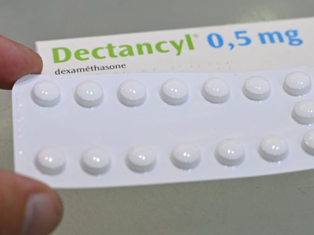 A picture taken on June 16, 2020 in Paris shows tablets of Dectancyl, a drug manufactured